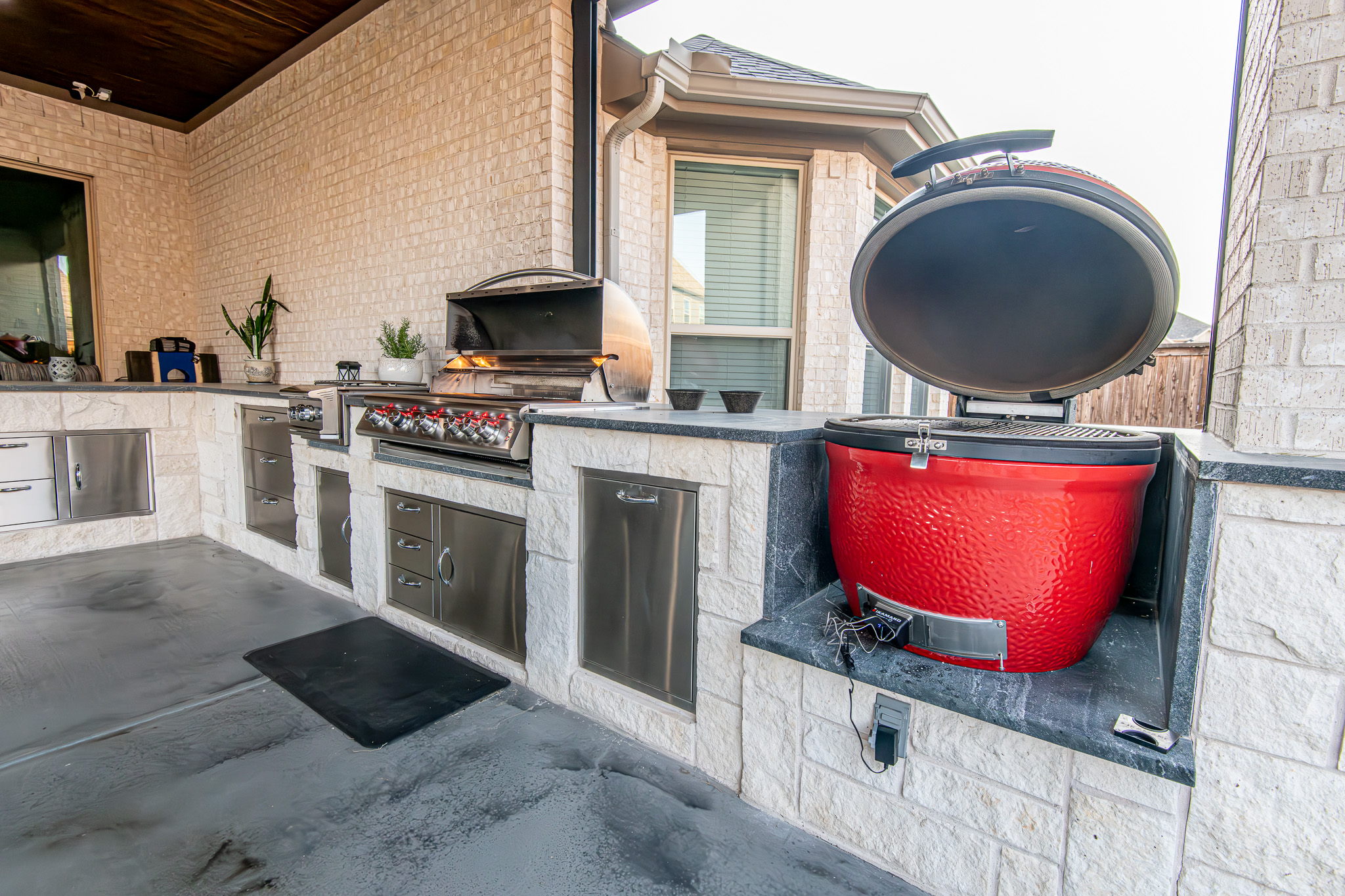 Outdoor kitchen designed and installed by Texas Direct Roofing and Construction