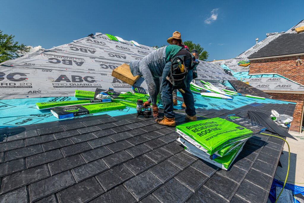 A Texas Direct Roofing crew installing a residential roof in the Dallas Fort Worth area
