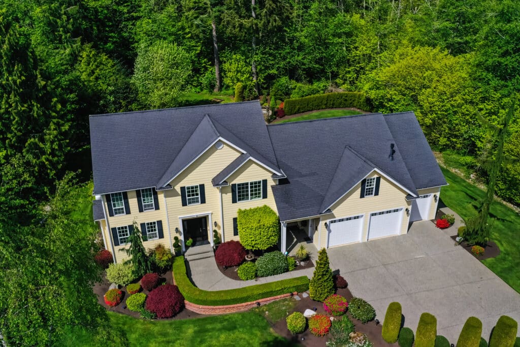 A residential home with a new asphalt shingle roof