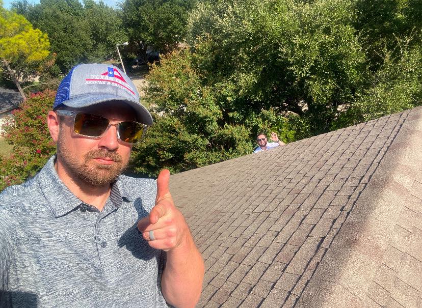 A Texas Direct Roofing inspector performing a free roof inspection